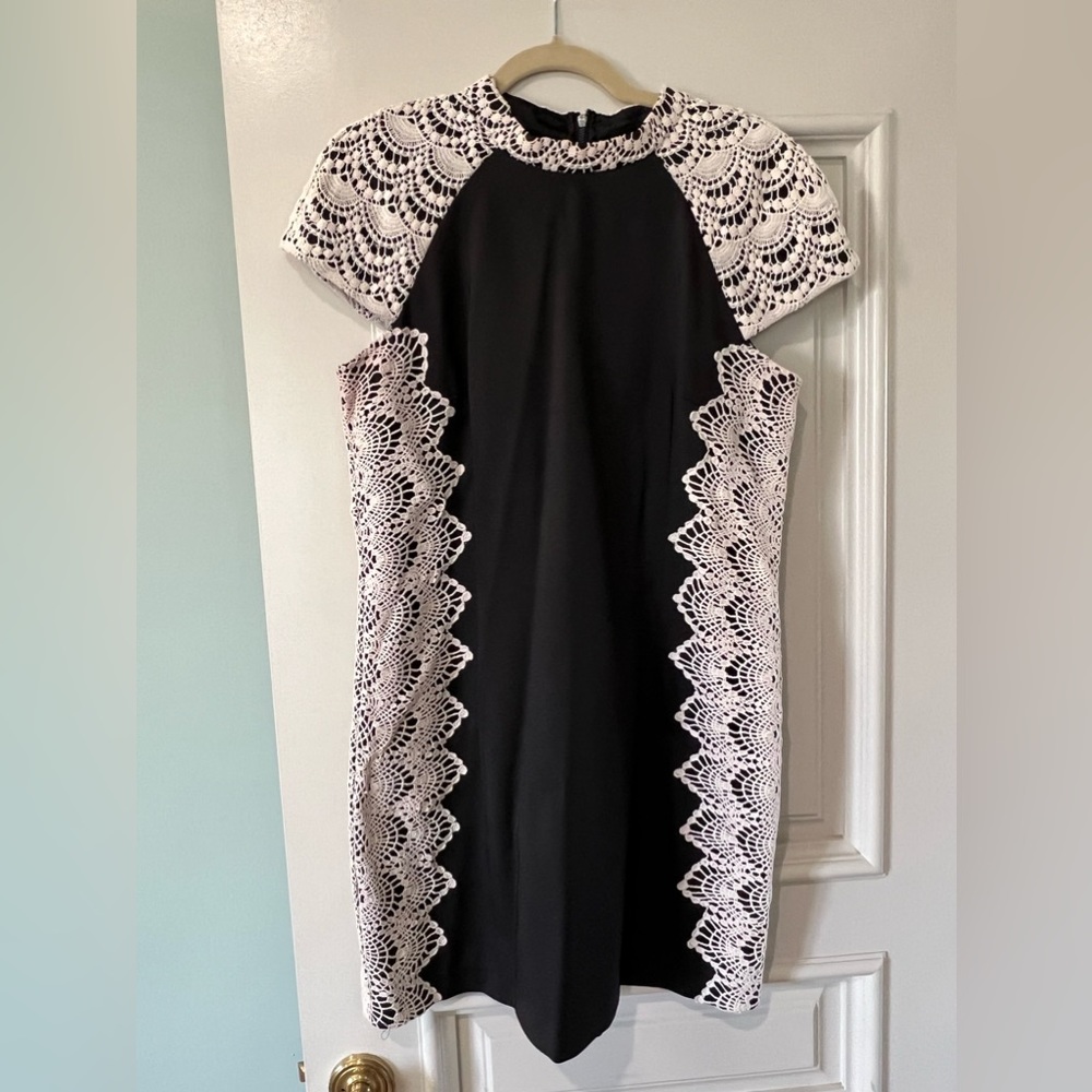 Kenzie dress, SIZE XL. Super flattering little black dress with side lace/neck